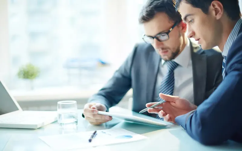 New York business owner reviewing an ADA lawsuit complaint with a defense attorney